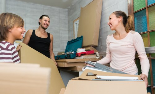 Boxes and household items being assessed for transparent Peckham storage pricing
