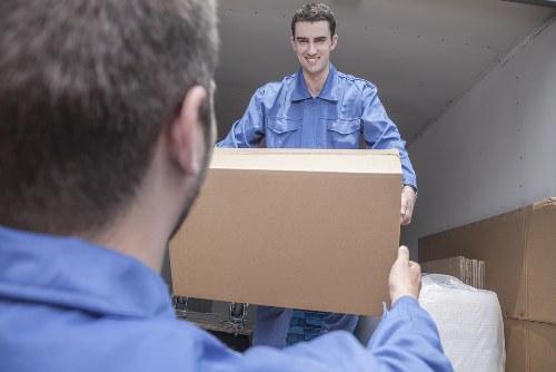 Local packing team preparing household items for a move in Peckham