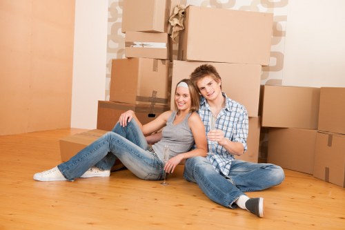 Local removals team managing a move in Peckham street
