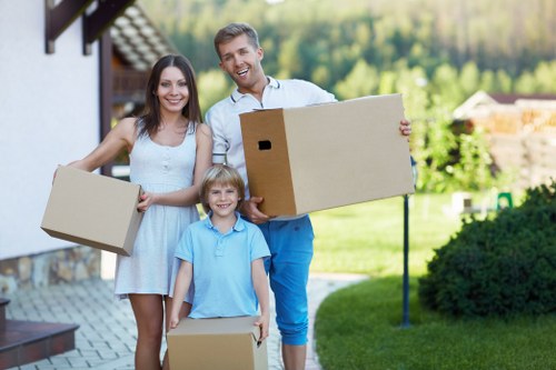 Commercial moving team handling office furniture in Peckham