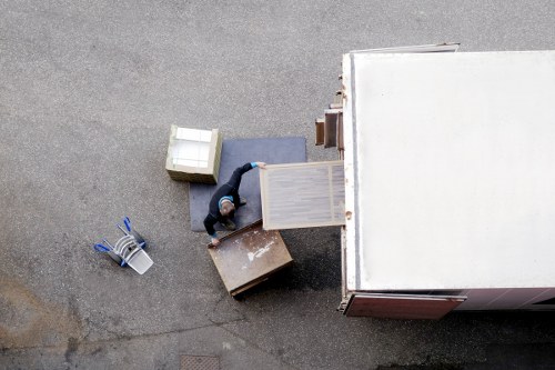 Professional man and van helping with a flat move in Peckham